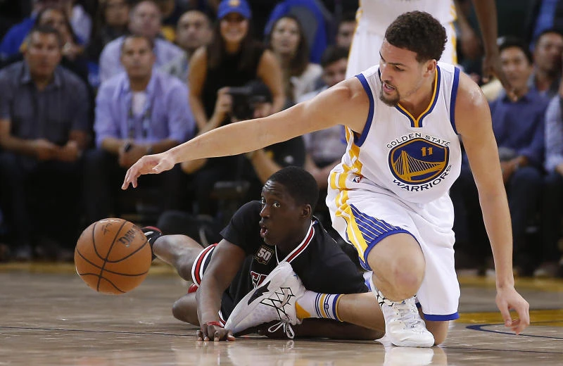 Warriors beat Bulls, improve to 14-0 and close on record