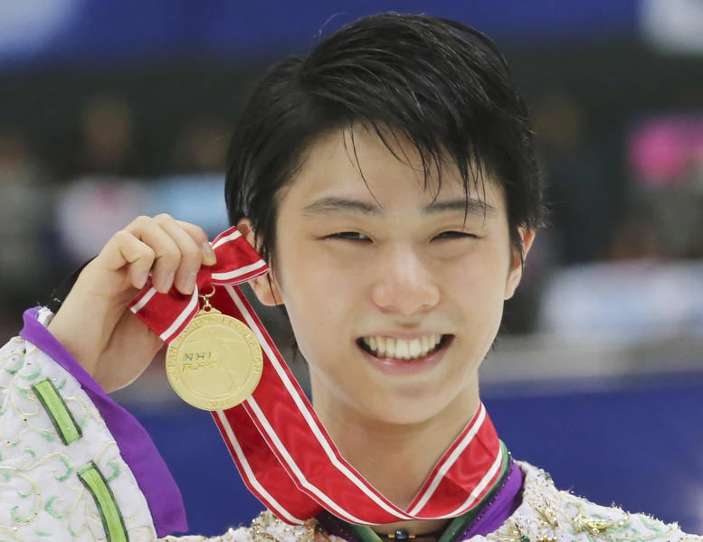Olympic champion Hanyu sets record score to win NHK Trophy