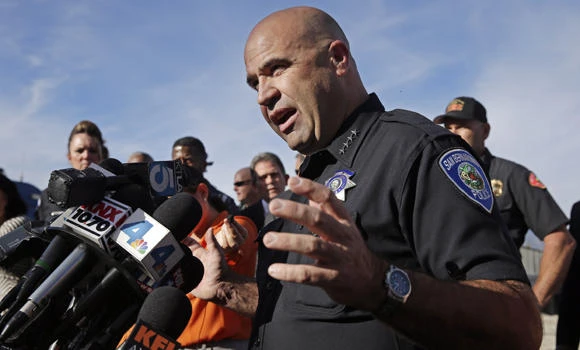 Motive sought in California massacre; slain suspect's kin 'shocked'
