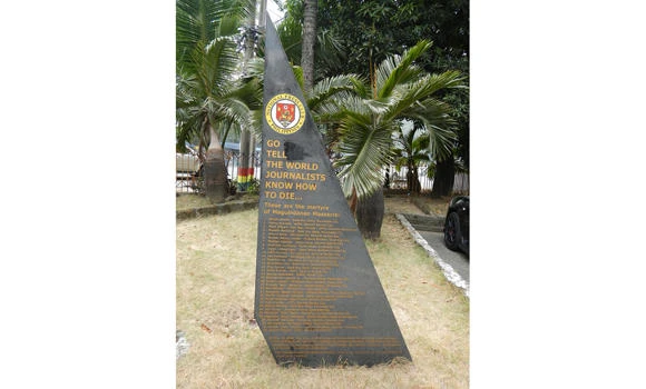 Philippines sacks 21 policemen over 2009 massacre