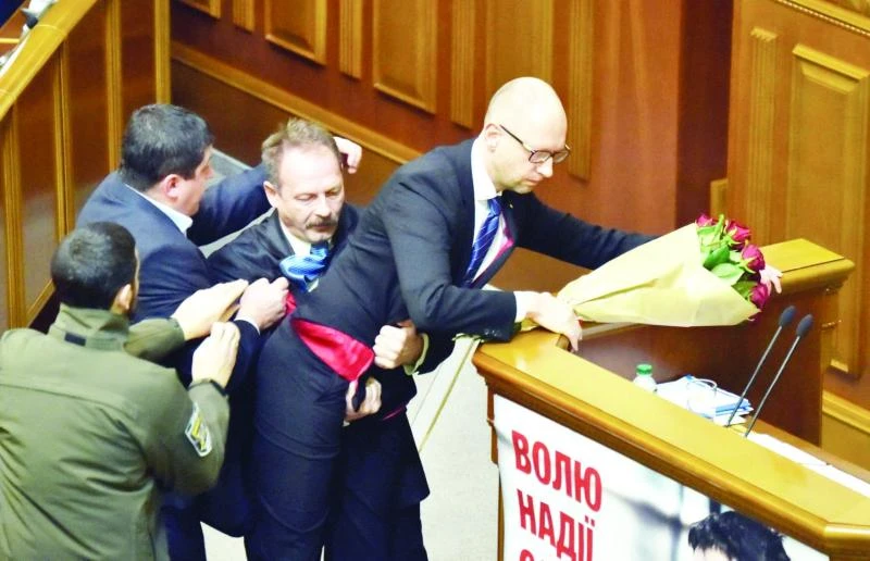 Ukraine lawmaker manhandles PM in rowdy Parliament scenes