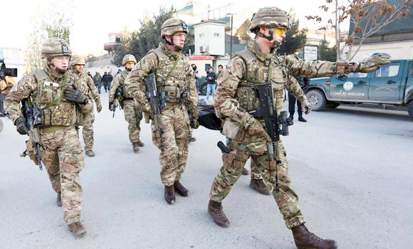 Afghan forces battle to hold off Taliban in Helmand district