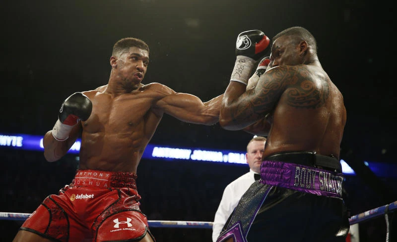 Joshua wins British heavyweight title with 15th knockout