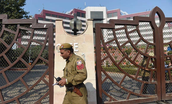 Delhi chief minister accuses ‘psycho’ Modi after raid