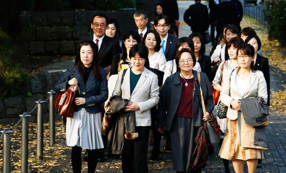 Japanese court upholds common surnames for married couples