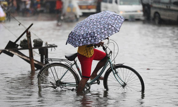 Philippine typhoon death toll climbs to 11; floods persist
