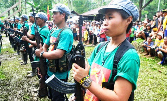Maoists ambush Philippine convoy as typhoon death toll hits 41