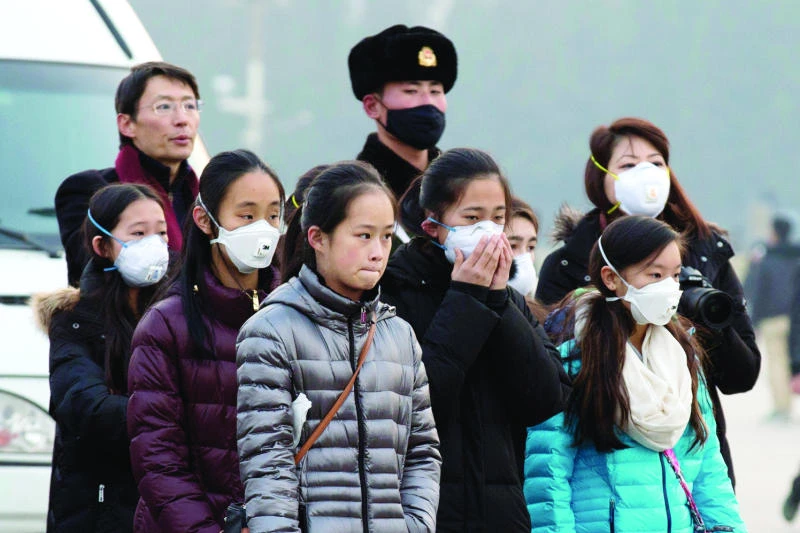Beijing issues second red alert as choking smog sets in again