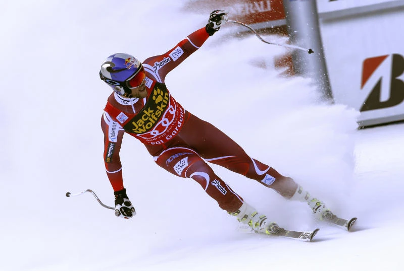Svindal wins downhill; air bag inflates in Mayer crash