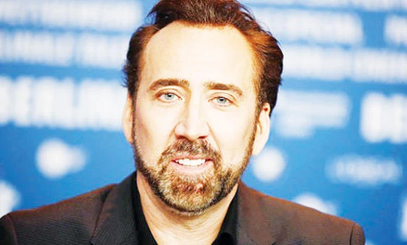 Nicolas Cage returns stolen dinosaur skull