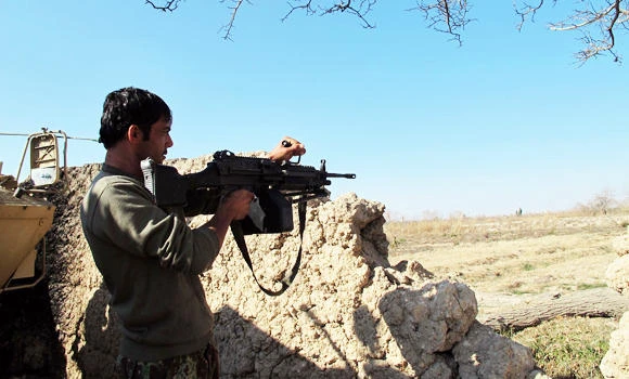Afghan forces still battling Taliban over southern district