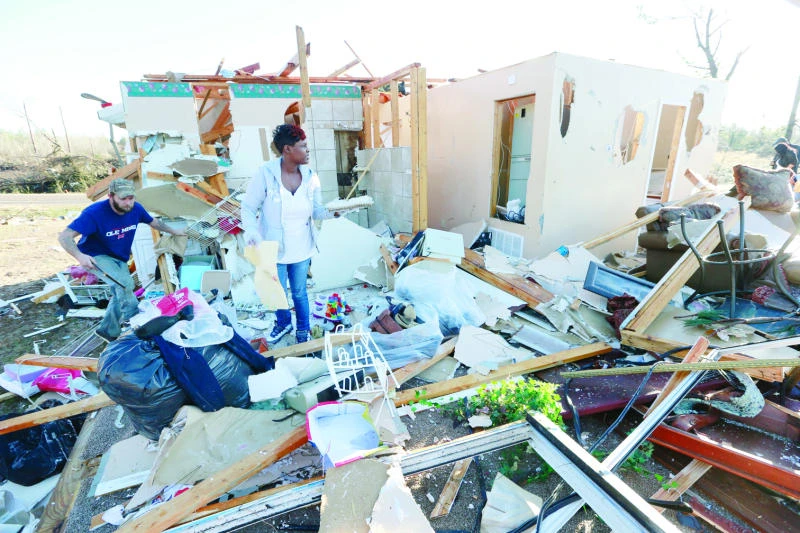 Cleanup begins from southern US storms that left 14 dead