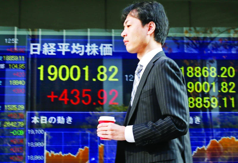 Japanese inflation ticks up in November, but spending weak