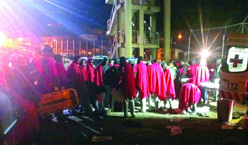 Hundreds of migrants storm Spanish border post