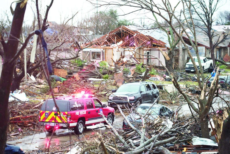 Death toll mounts as wild weather tears across US