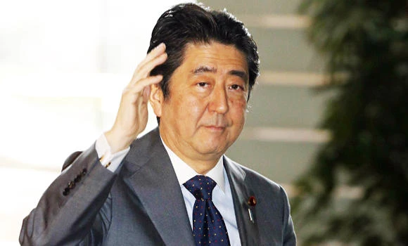 Japan PM pledges to keep country out of war