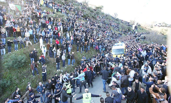 Algeria hero, longtime leader of opposition, buried in chaos
