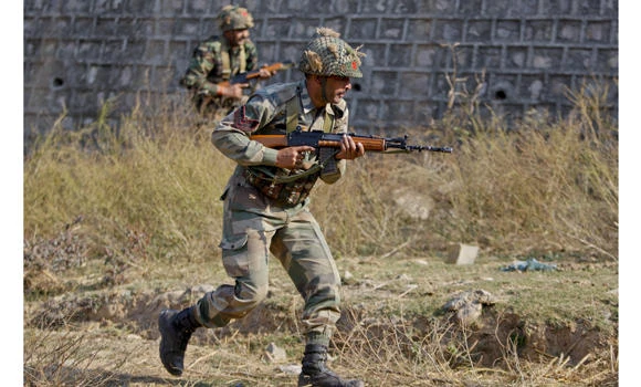 Indian troops still fighting 2 gunmen at Pathankot air base