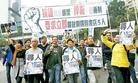 Thousands protest in HK over missing publishers