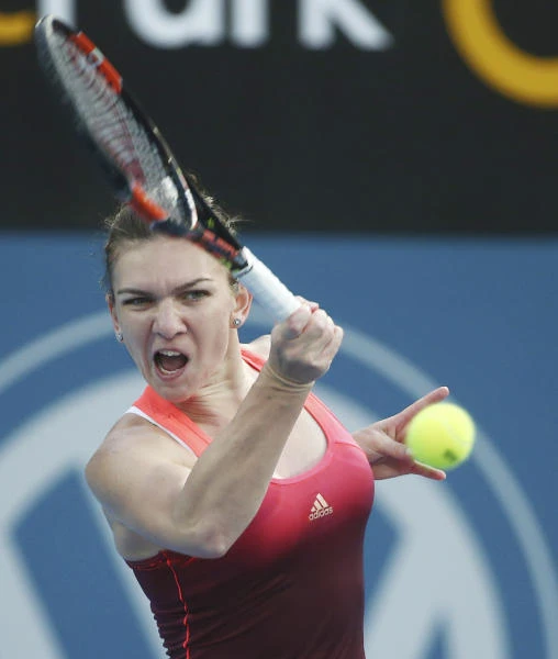 Halep wins on return but fitness doubts remain