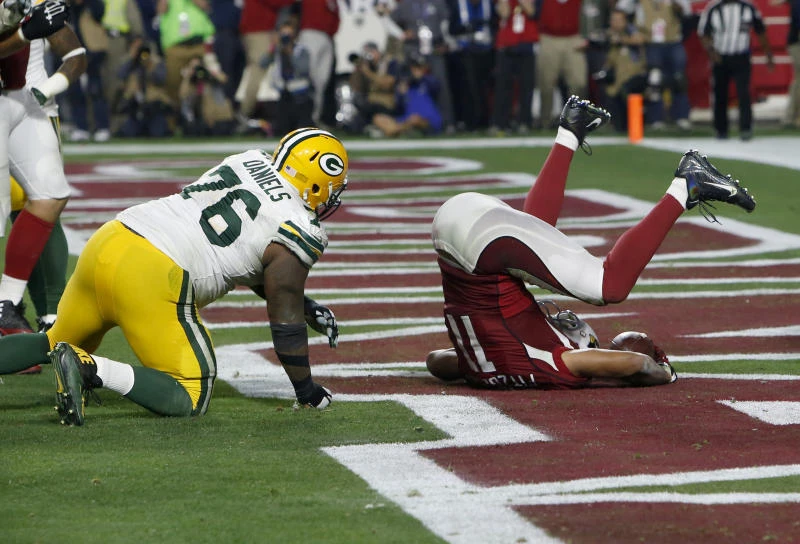 Cardinals beat Packers in OT, Patriots also advance