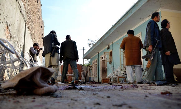 Suicide attack on Afghan politician's home leaves at least 13 dead
