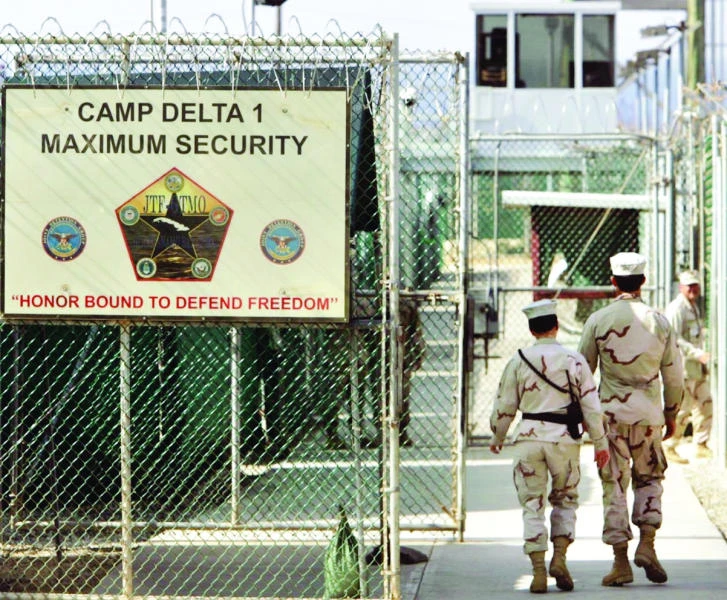 Two more prisoners at Guantanamo freed; one refuses to leave
