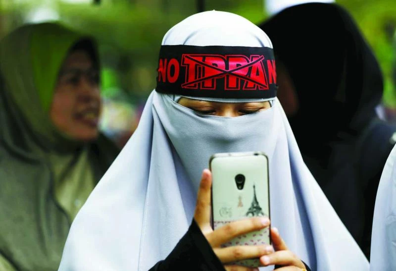 Demonstrators hit the streets to
oppose Malaysia signing TPP
