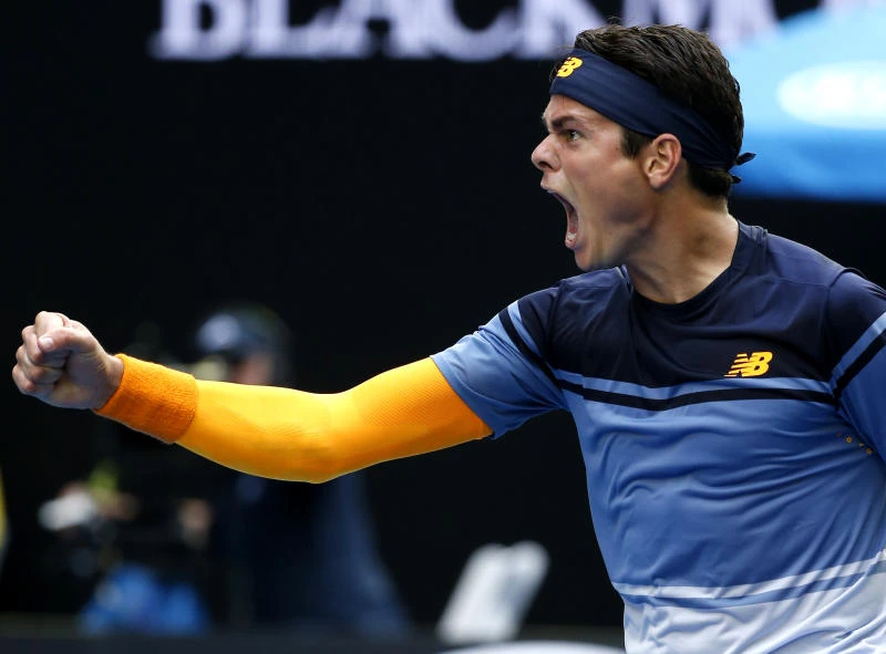 Raonic stuns Wawrinka, qualifier Zhang rolls on