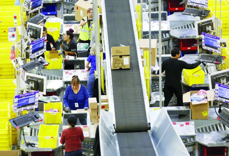 Amazon shares plunge as record earnings still miss estimates