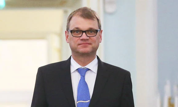 Finnish PM halts plan to host refugees