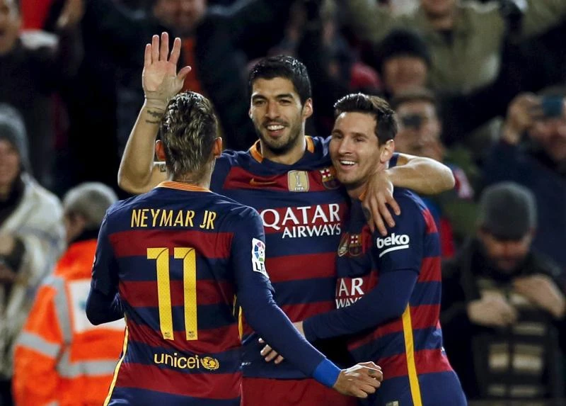 Suarez, Messi hat tricks hit Neville’s Valencia for seven