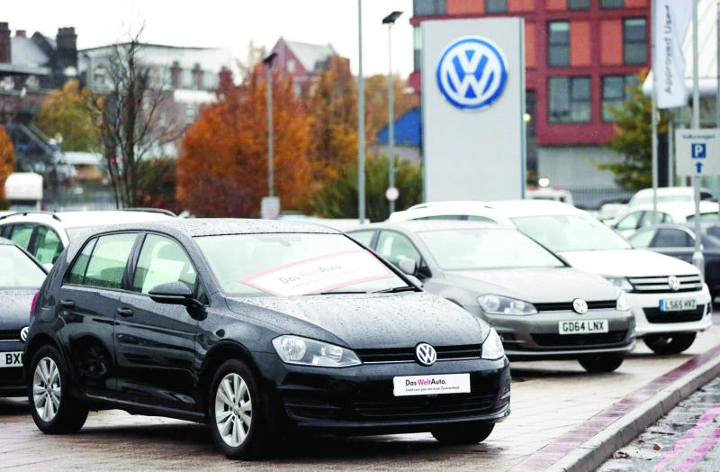 VW delays shareholder meet, results over emissions probe