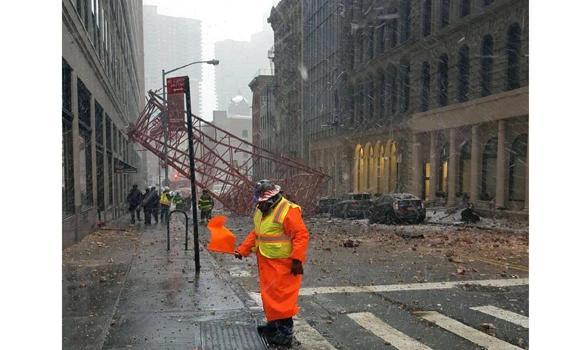 Giant crane crashes in New York, killing one person