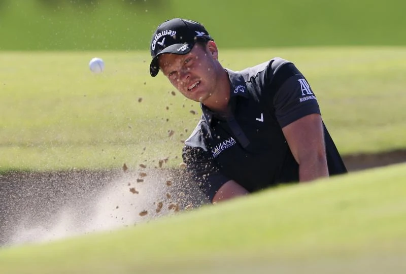 Willett shoots 65 to seize lead in Dubai