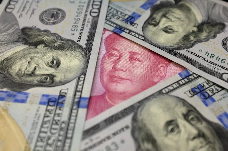 China forex reserves fall almost $100bn in January