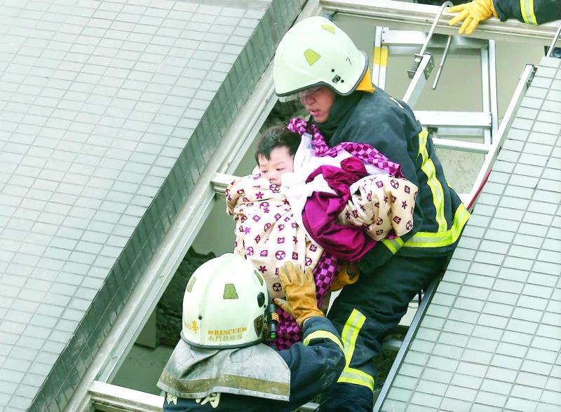 Rescuers race to save over 120 buried after Taiwan earthquake