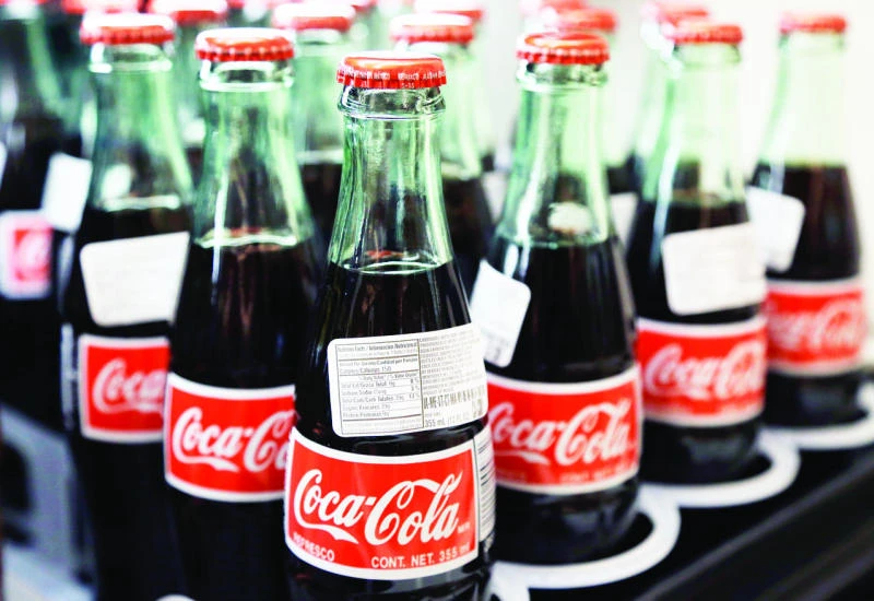 Coca-Cola earnings rise on higher volumes