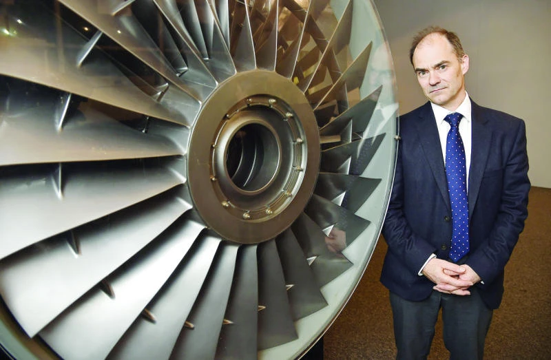 Rolls-Royce halves dividend but shares rally on turnaround hopes