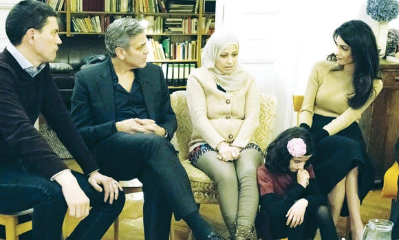 Clooneys meet Syrian refugees in Germany