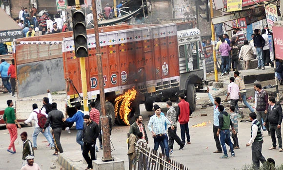 Indian police fire on caste protesters, one killed