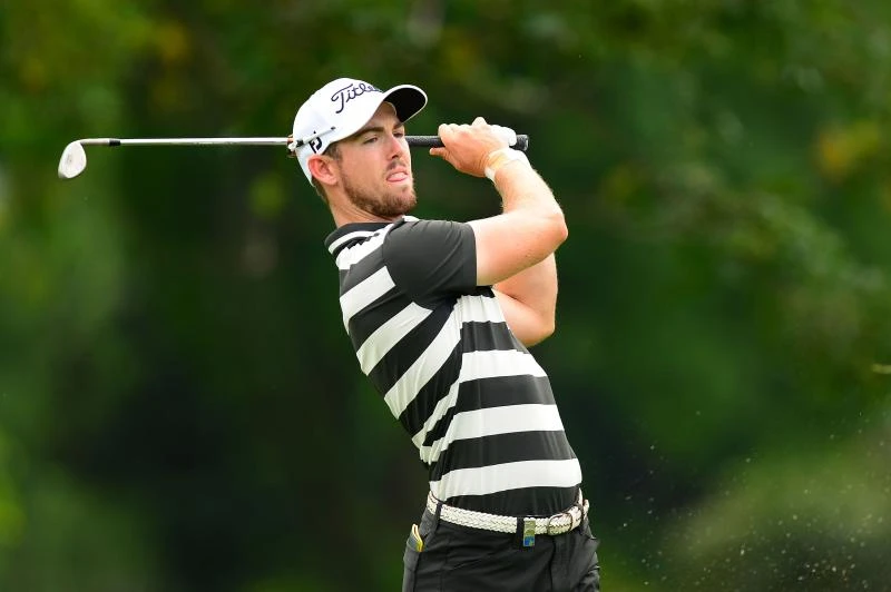 Impressive Holman stays in front in Malaysia