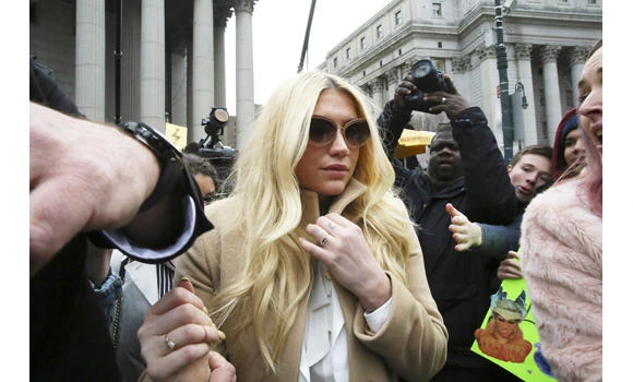 Speak out against abuse, Kesha urges women