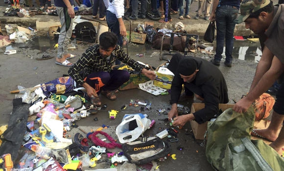 Twin bombings in Baghdad market kill at least 38