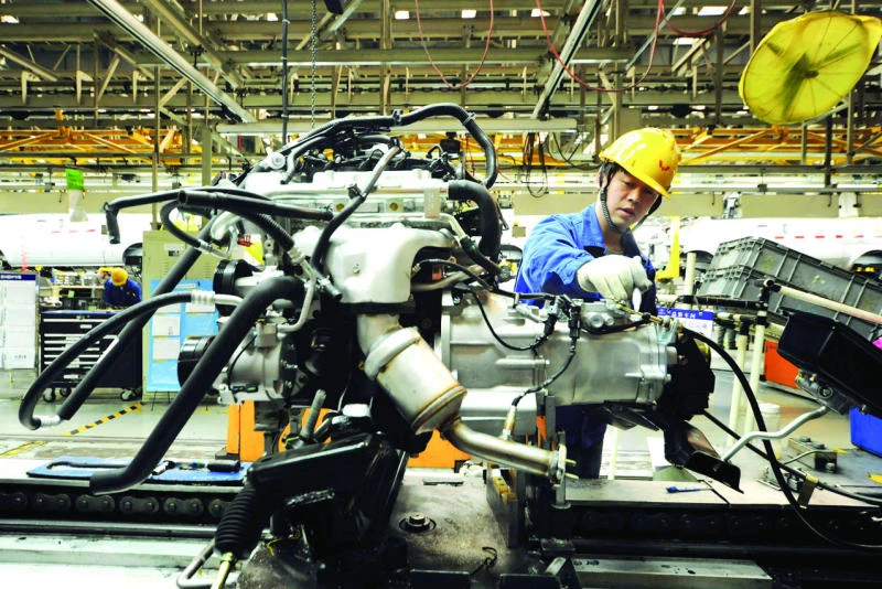 Chinese factories lose more momentum, surveys show