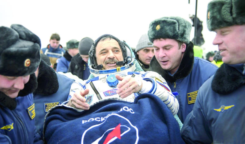 ‘We did it!’ Homecoming for 2 spacemen after year aloft