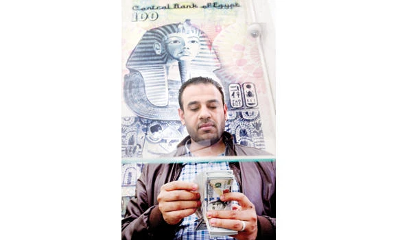 Egypt devalues pound as forex inflow declines