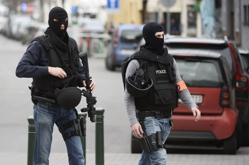 French and Belgian police came under fire in Brussels raid: Cazeneuve