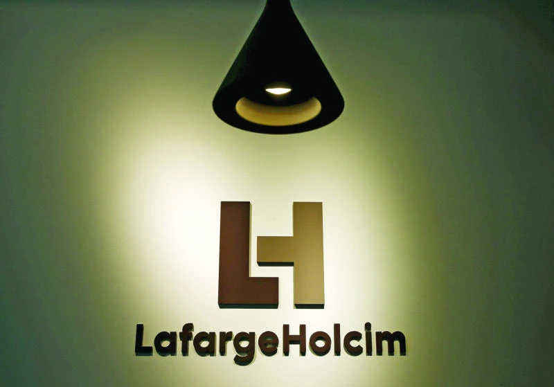 LafargeHolcim sees return to profit as sales rise