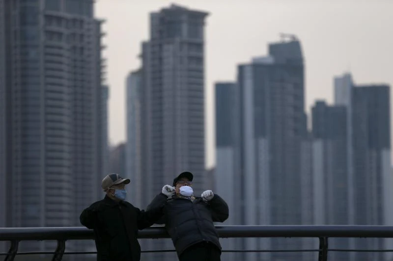 Shanghai unveils rules to cool home prices